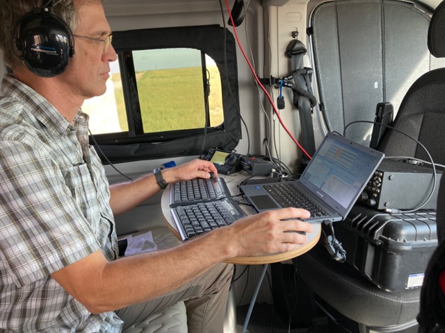 Erik K0IM operating in the van on LOG/WAS/YUM lines.